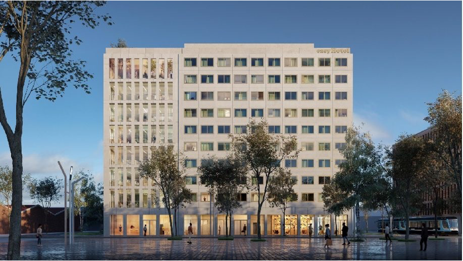 Modern easyHotel building facade in Paris Nord Aubervilliers, featuring multiple windows, trees, and pedestrians on a clear day.